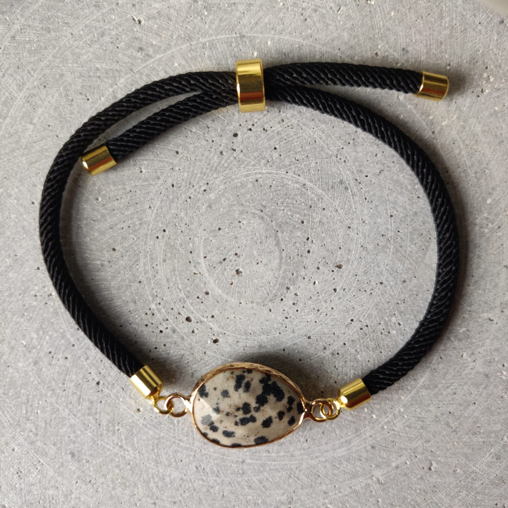 Dalmatian Jasper Adjustable Blacelet on a Black Twisted Cord