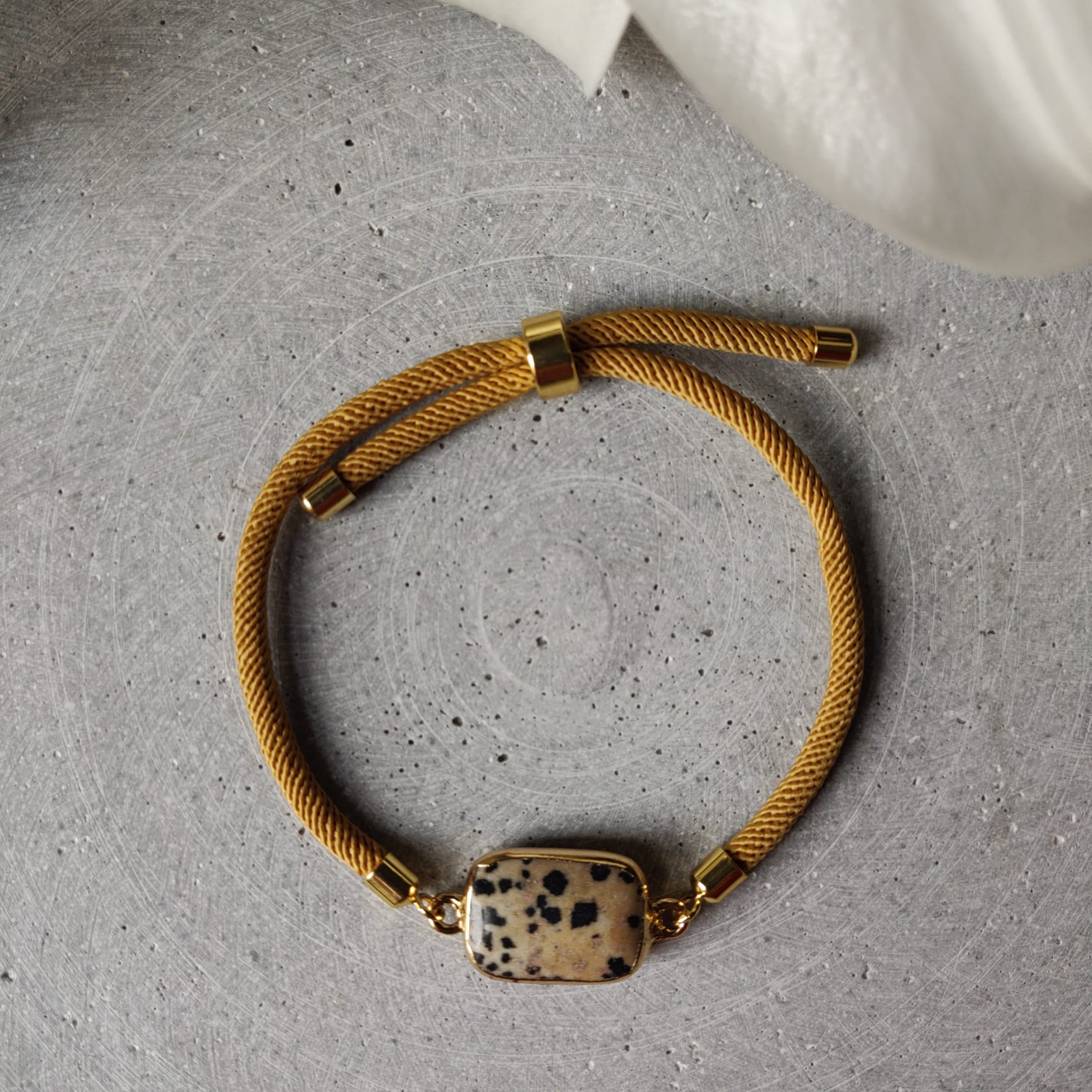 Dalmatian Jasper Adjustable Bracelet on a Mustard Twisted Cord