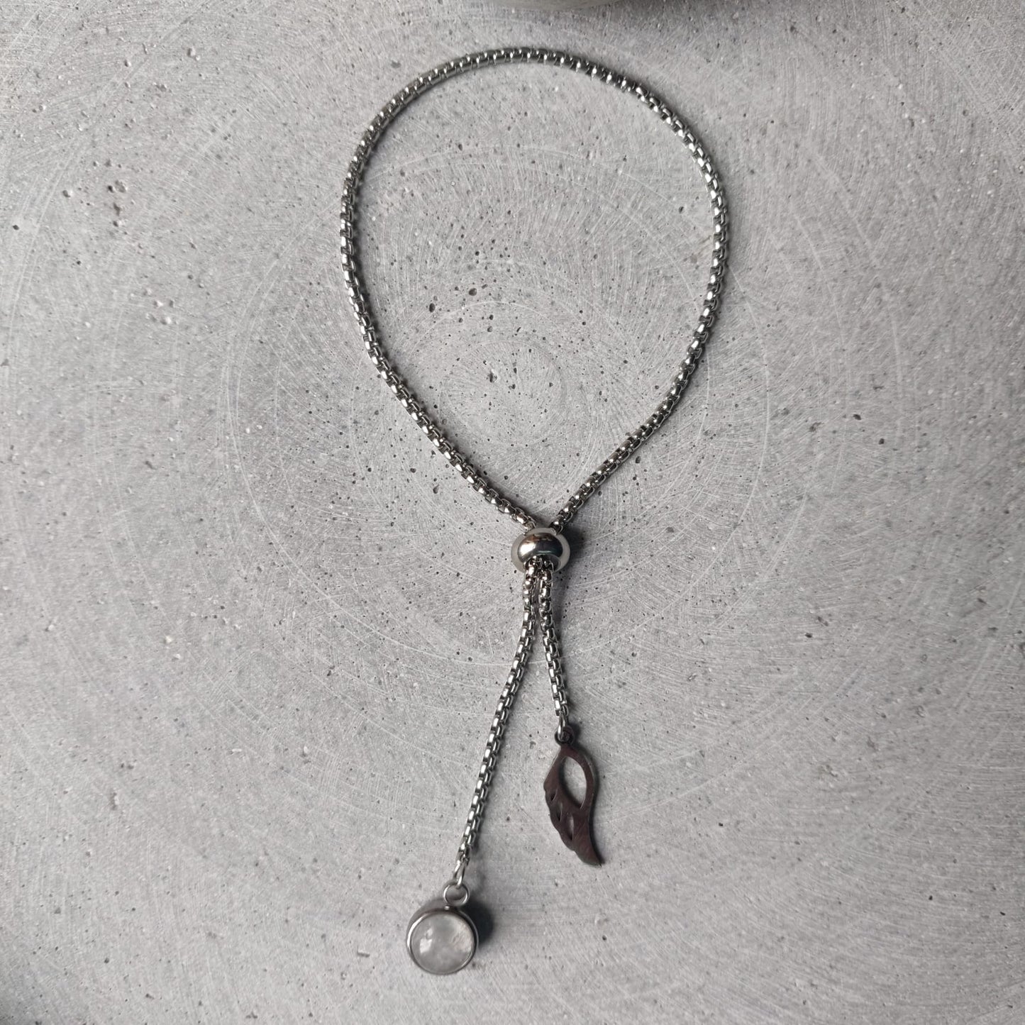 Clear Quartz Dangle Bracelet With Angel Wing Charm on Stainless Steel Box Chain