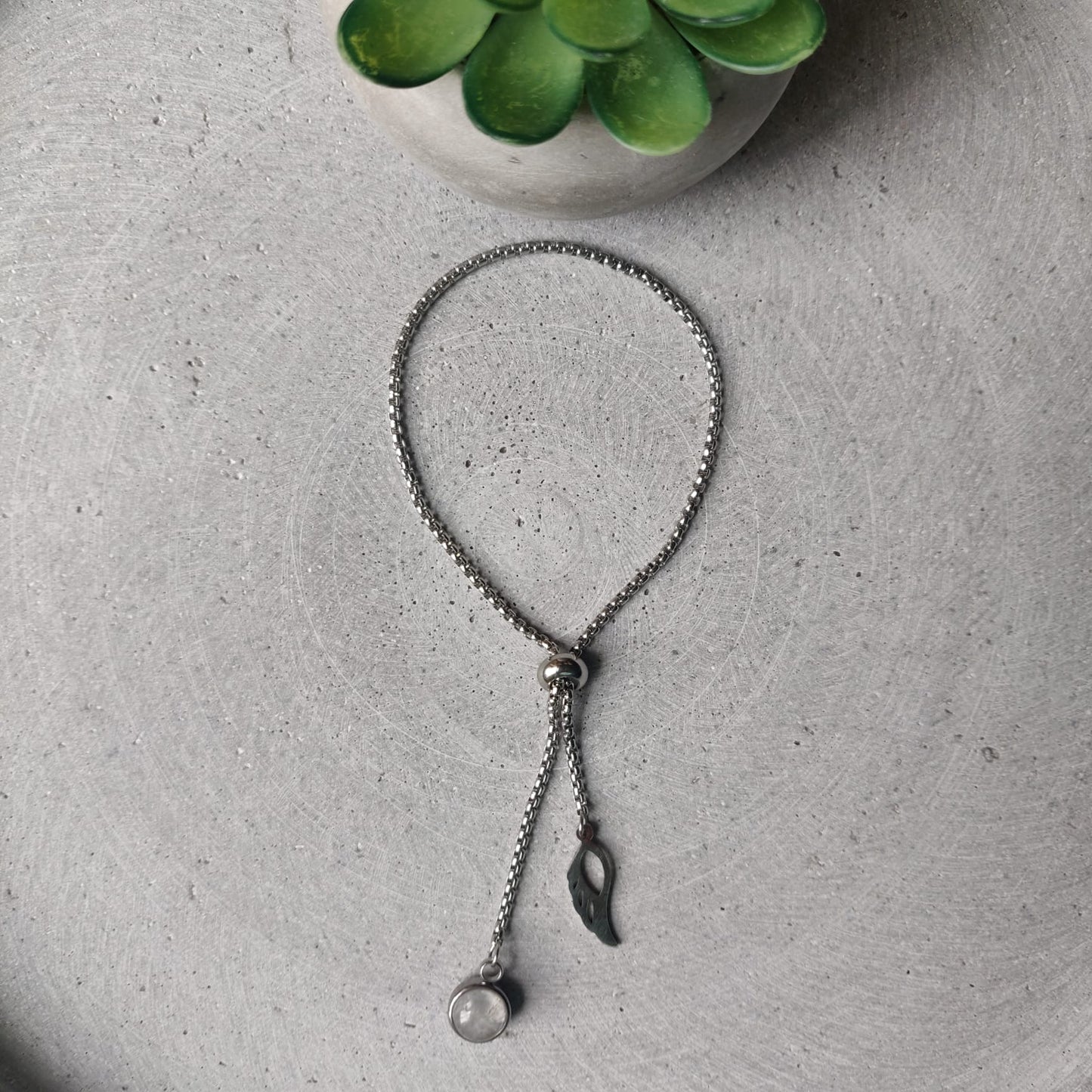 Clear Quartz Dangle Bracelet With Angel Wing Charm on Stainless Steel Box Chain