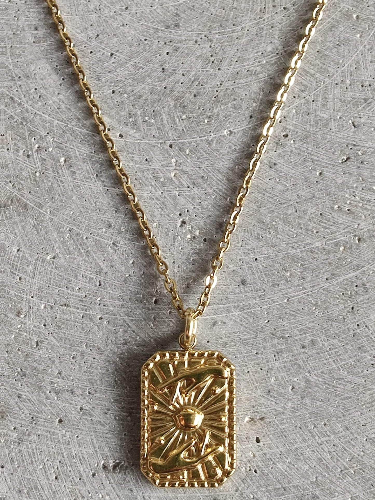 Sun With Hands Gold Tone Stainless Steel Necklace