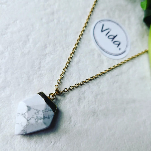 Howlite Crystal Arrow on Gold Tone Stainless Steel Necklace
