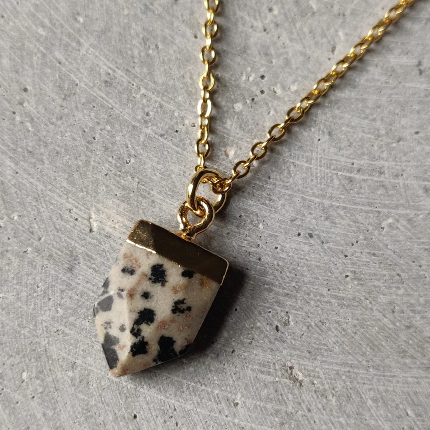 Dalmatian Jasper Crystal Arrow on Gold Tone Stainless Steel Necklace